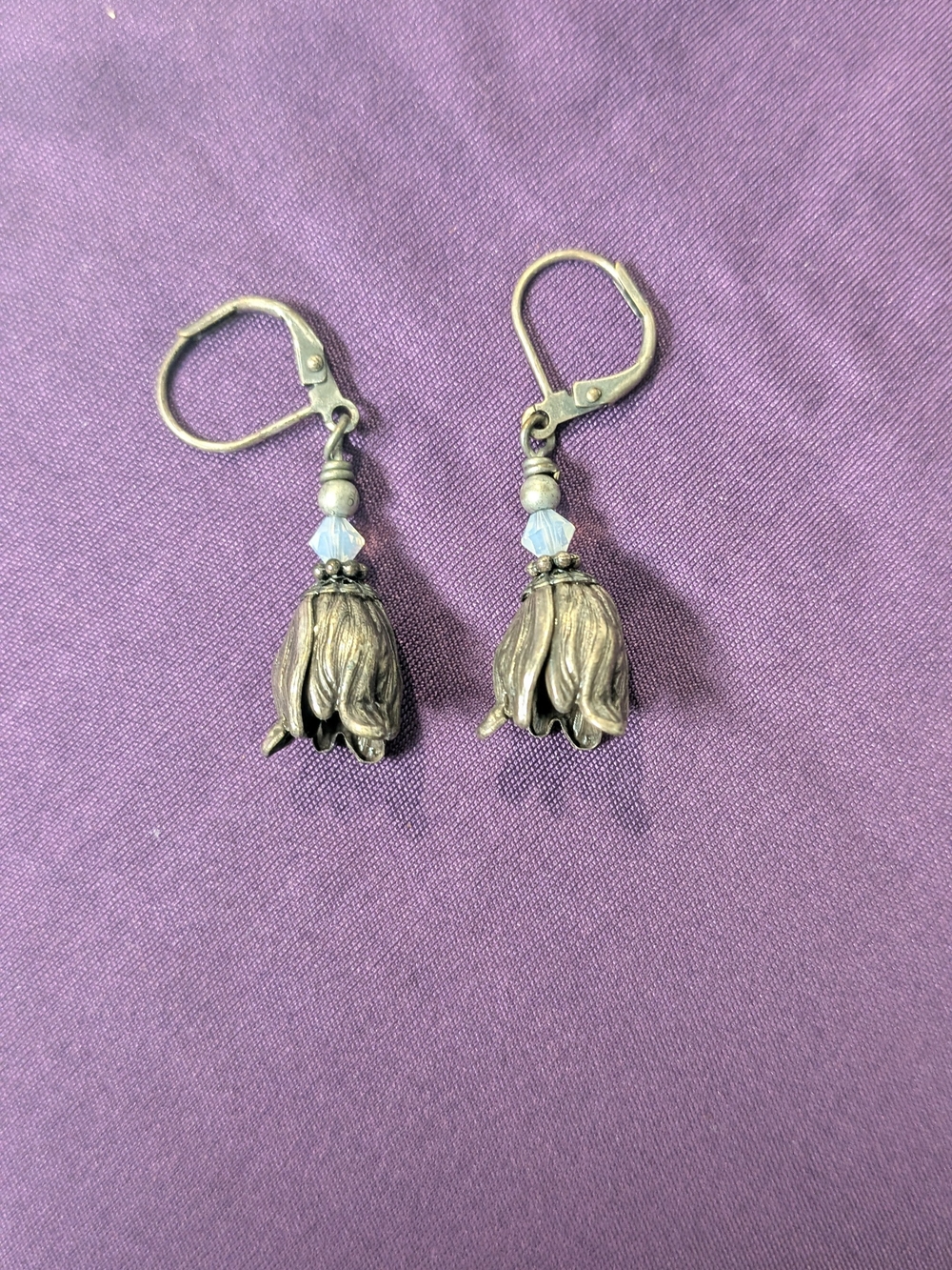 Vintage-Style Silver Floral Drop Earrings with Light Blue Crystal